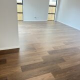 2a7ca8fbbb4a5eb723cf184c9470c7d Bring a touch of classic sophistication to your home with <strong>English Walnut Oak</strong>. Its rich walnut tones and detailed grain pattern exude elegance, making it a standout option for both traditional and contemporary designs. Designed with <strong>water-resistant flooring</strong> technology, it provides excellent protection against spills and moisture. Perfect for creating warm and inviting spaces, English Walnut Oak is a durable and stylish choice for <strong>laminate wood flooring</strong> enthusiasts.