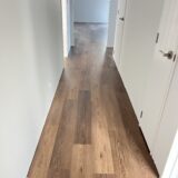 4a7d40554c4bb950e6b352d9d9aa3eb Bring a touch of classic sophistication to your home with <strong>English Walnut Oak</strong>. Its rich walnut tones and detailed grain pattern exude elegance, making it a standout option for both traditional and contemporary designs. Designed with <strong>water-resistant flooring</strong> technology, it provides excellent protection against spills and moisture. Perfect for creating warm and inviting spaces, English Walnut Oak is a durable and stylish choice for <strong>laminate wood flooring</strong> enthusiasts.