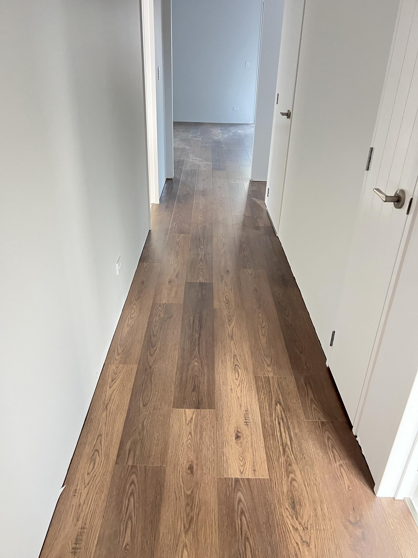 4a7d40554c4bb950e6b352d9d9aa3eb 4a7d40554c4bb950e6b352d9d9aa3eb Bring a touch of classic sophistication to your home with <strong>English Walnut Oak</strong>. Its rich walnut tones and detailed grain pattern exude elegance, making it a standout option for both traditional and contemporary designs. Designed with <strong>water-resistant flooring</strong> technology, it provides excellent protection against spills and moisture. Perfect for creating warm and inviting spaces, English Walnut Oak is a durable and stylish choice for <strong>laminate wood flooring</strong> enthusiasts.