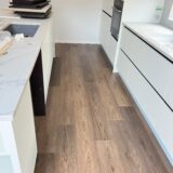 50688e655558fe73c90c1e47d7266fc Bring a touch of classic sophistication to your home with <strong>English Walnut Oak</strong>. Its rich walnut tones and detailed grain pattern exude elegance, making it a standout option for both traditional and contemporary designs. Designed with <strong>water-resistant flooring</strong> technology, it provides excellent protection against spills and moisture. Perfect for creating warm and inviting spaces, English Walnut Oak is a durable and stylish choice for <strong>laminate wood flooring</strong> enthusiasts.