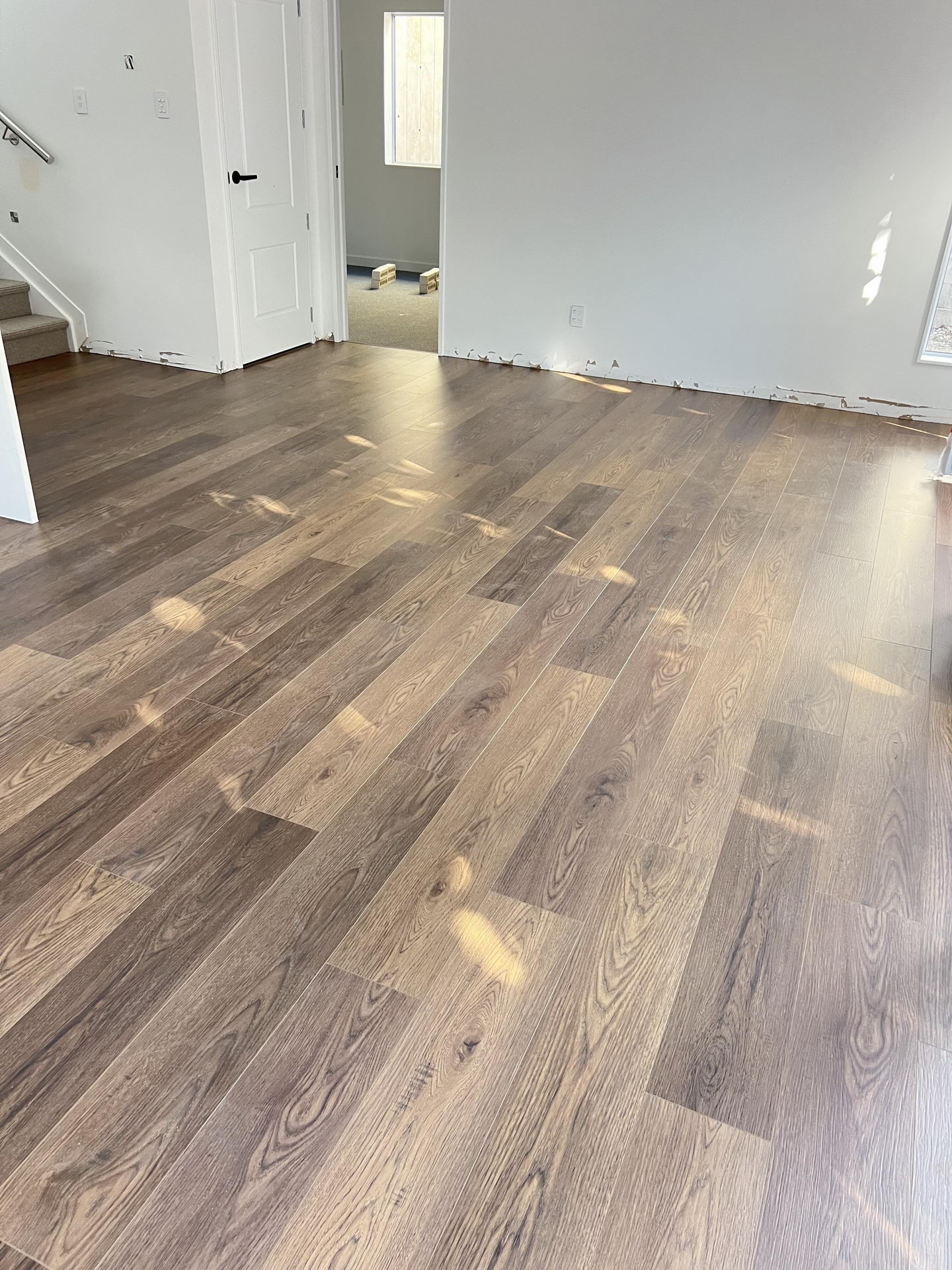 b1d0ca3638b262ec6750ea75ed8edb1 b1d0ca3638b262ec6750ea75ed8edb1 rotated Bring a touch of classic sophistication to your home with <strong>English Walnut Oak</strong>. Its rich walnut tones and detailed grain pattern exude elegance, making it a standout option for both traditional and contemporary designs. Designed with <strong>water-resistant flooring</strong> technology, it provides excellent protection against spills and moisture. Perfect for creating warm and inviting spaces, English Walnut Oak is a durable and stylish choice for <strong>laminate wood flooring</strong> enthusiasts.