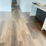 c905159b72bb683d8787fad73e0c0ad Bring a touch of classic sophistication to your home with <strong>English Walnut Oak</strong>. Its rich walnut tones and detailed grain pattern exude elegance, making it a standout option for both traditional and contemporary designs. Designed with <strong>water-resistant flooring</strong> technology, it provides excellent protection against spills and moisture. Perfect for creating warm and inviting spaces, English Walnut Oak is a durable and stylish choice for <strong>laminate wood flooring</strong> enthusiasts.