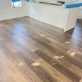 d0841d837e3b376f53b522d6739e17a rotated Bring a touch of classic sophistication to your home with <strong>English Walnut Oak</strong>. Its rich walnut tones and detailed grain pattern exude elegance, making it a standout option for both traditional and contemporary designs. Designed with <strong>water-resistant flooring</strong> technology, it provides excellent protection against spills and moisture. Perfect for creating warm and inviting spaces, English Walnut Oak is a durable and stylish choice for <strong>laminate wood flooring</strong> enthusiasts.