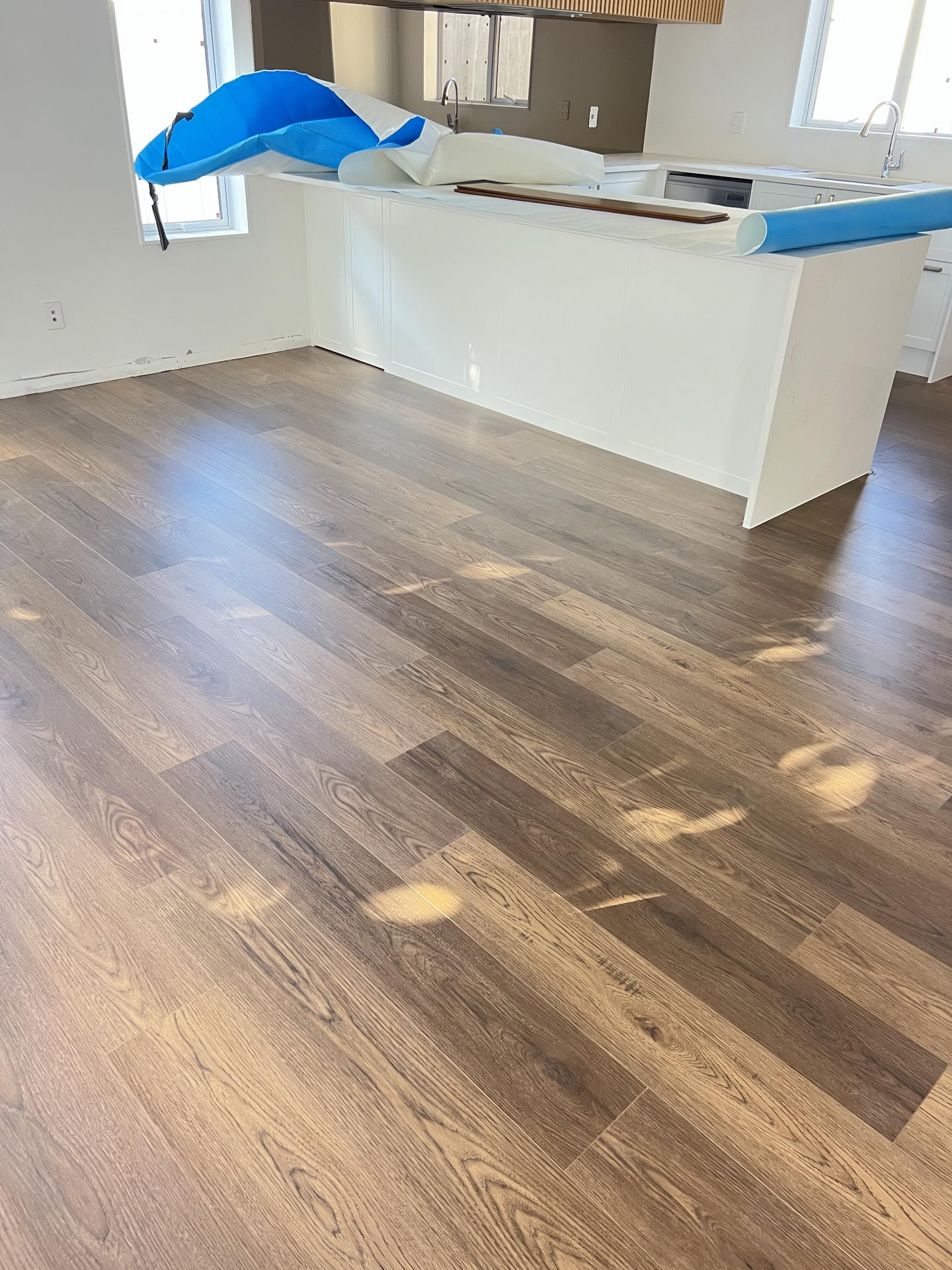 d0841d837e3b376f53b522d6739e17a d0841d837e3b376f53b522d6739e17a rotated Bring a touch of classic sophistication to your home with <strong>English Walnut Oak</strong>. Its rich walnut tones and detailed grain pattern exude elegance, making it a standout option for both traditional and contemporary designs. Designed with <strong>water-resistant flooring</strong> technology, it provides excellent protection against spills and moisture. Perfect for creating warm and inviting spaces, English Walnut Oak is a durable and stylish choice for <strong>laminate wood flooring</strong> enthusiasts.